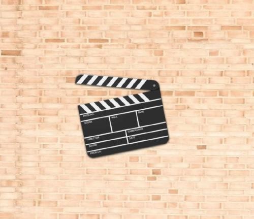 Zur Hälfte geöffnete Filmklappe Zur Hälfte geöffnete Filmklappe